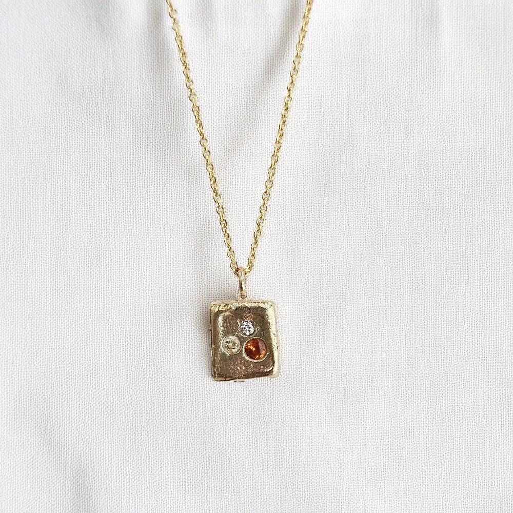cast in place yellow gold diamond sapphire necklace zoe alexandria jewellery