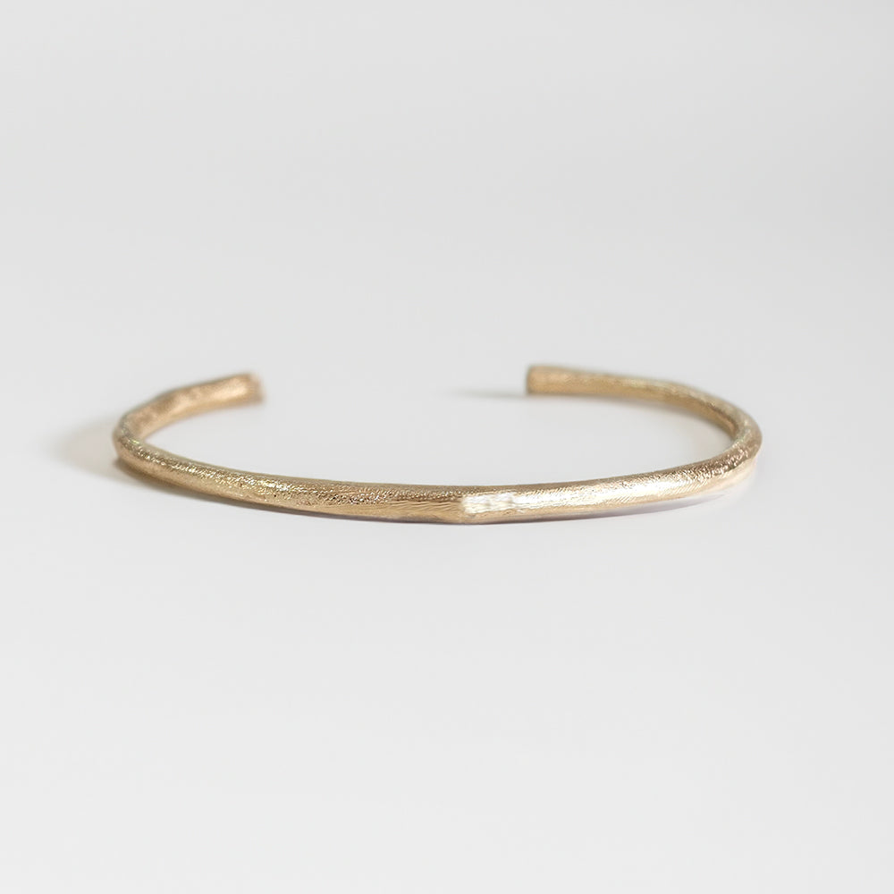 sandcast gold bracelet, handmade cuff by zoe alexandria jewellery
