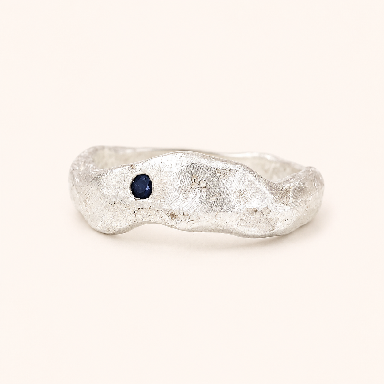 sandcast cove ring with single sapphire recycled silver by zoe alexandria jewellery