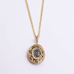 cast in place yellow gold blue sapphire necklace zoe alexandria jewellery