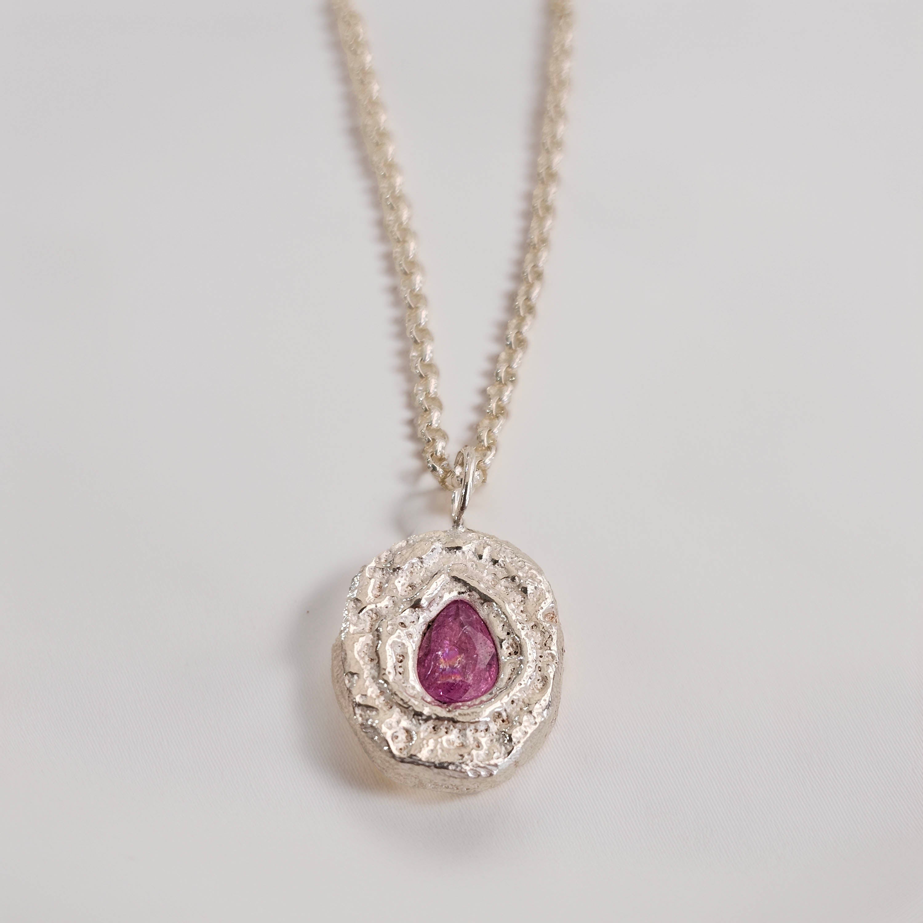 organic cast in place sapphire pendant handmade by zoe alexandria jewellery