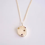 organic cast in place silver sapphire pendant handmade by zoe alexandria jewellery