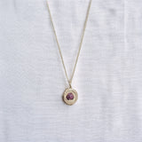 cast in place rough pink sapphire pendant by zoe alexandria jewellery recycled silver