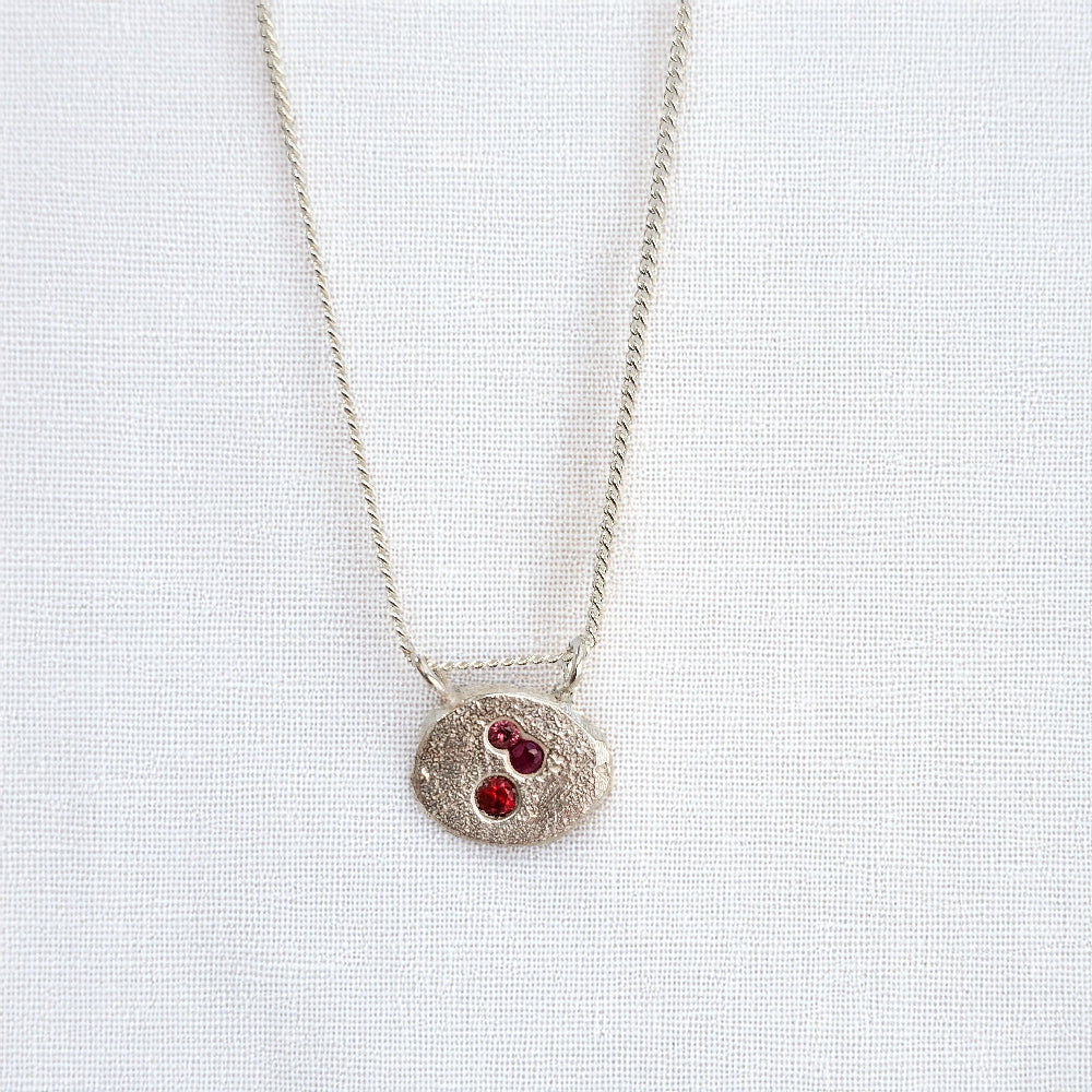 silver cast in place sapphire stone necklace handmade by zoe alexandria jewellery