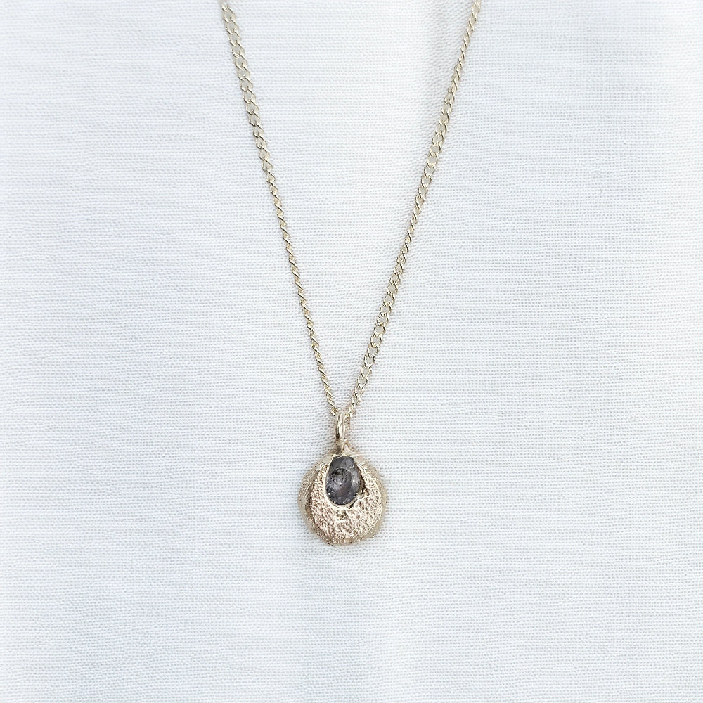 cast in place blue sapphire pendant by zoe alexandria jewellery recycled silver