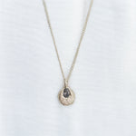 cast in place blue sapphire pendant by zoe alexandria jewellery recycled silver