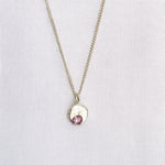 cast in place pink sapphire pendant by zoe alexandria jewellery recycled silver
