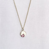cast in place pink sapphire pendant by zoe alexandria jewellery recycled silver