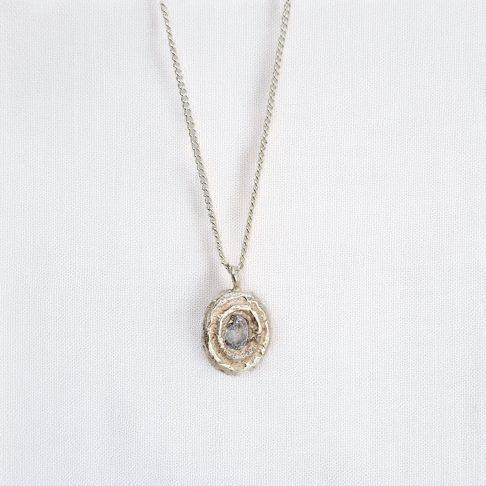 organic cast in place sapphire pendant handmade by zoe alexandria jewellery