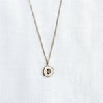 cast in place blue sapphire pendant by zoe alexandria jewellery recycled silver