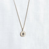 cast in place blue sapphire pendant by zoe alexandria jewellery recycled silver