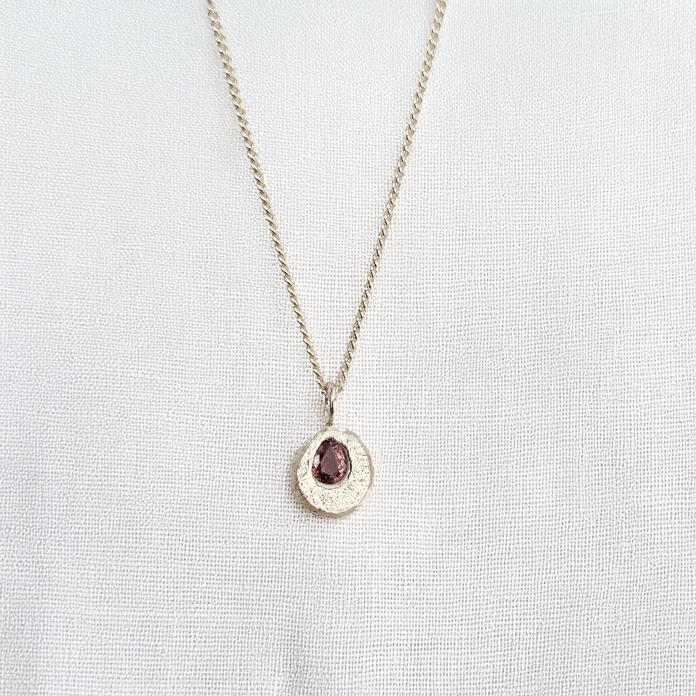 cast in place peach sapphire pendant by zoe alexandria jewellery recycled silver