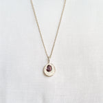 cast in place peach sapphire pendant by zoe alexandria jewellery recycled silver
