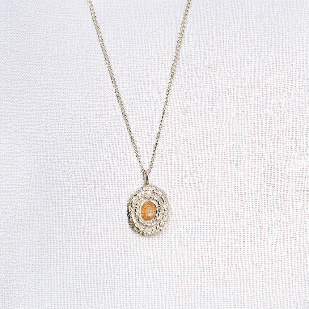 organic cast in place sapphire pendant handmade by zoe alexandria jewellery